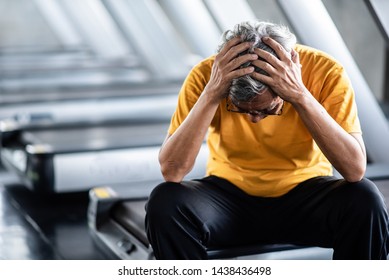 Elderly Man Headache At The Gym
