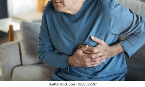 An elderly man with heart problems - Shutterstock ID 2238555107
