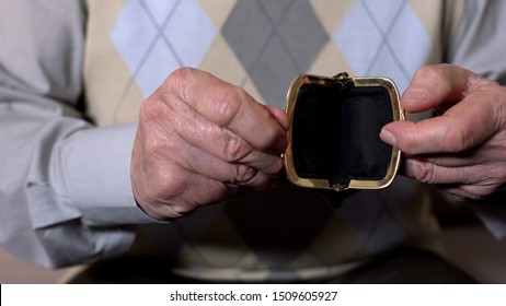 Elderly Man Holding Empty Purse, Lack Of Money, Pension Poverty, Bankruptcy