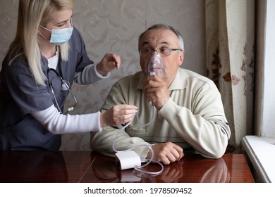Elderly man on oxygen mask, nebulizer - Shutterstock ID 1978509452