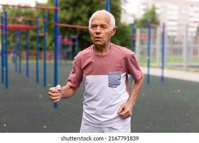 An Elderly Man Running Past An Outdoor