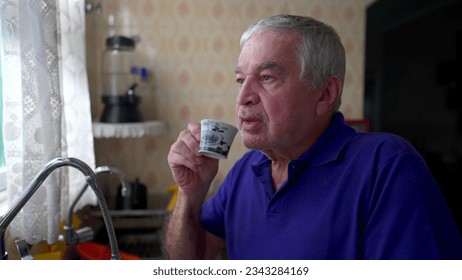 Elderly Man Savoring Morning Coffee, Peaceful Moment by Home Window - Powered by Shutterstock