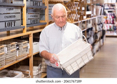 Elderly Man Searching Storage Basket At Home Decor Store