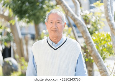 Elderly man with serious face - Powered by Shutterstock