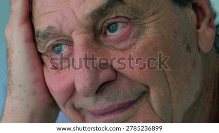 Elderly man smiling softly with distant look, close up portrait expressing tenderness, warmth, and emotional depth through aging face and gentle eyes
