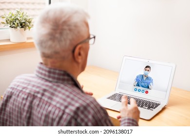 Elderly Man Talking To NHS Doctor Over Laptop Computer,concept Of Online On-demand Medical Help Via Video Calling App,remote Distance Conversation With General Practitioner During Coronavirus Pandemic