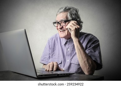 Elderly Man Using Technology 