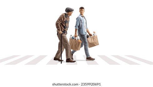 Elderly man walking with a cane and a young man carrying his grocery bags at a pedestrian crosswalk isolated on white background - Powered by Shutterstock