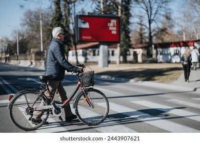 An elderly man walks with his bike beside a crosswalk in an urban setting, portraying active senior lifestyle and sustainable transportation. - Powered by Shutterstock