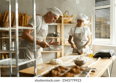 Elderly man and woman sift flour and - Powered by Shutterstock