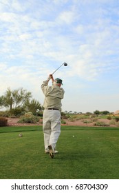 Elderly Man's Golf Swing Follow-through