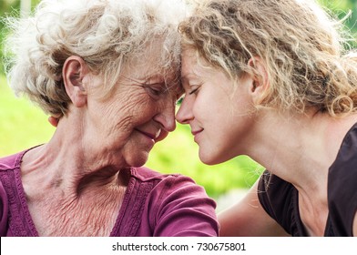 Elderly  mother and daughter face to face