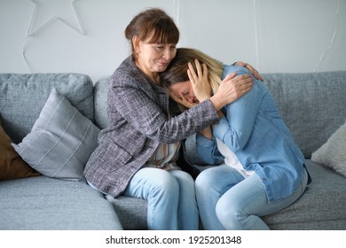 Elderly Mother Hug Crying Adult Daughter Show Support And Care , Supportive Senior Woman Embrace Cuddle Grownup Child Feeling Depressed, Having Life Problems