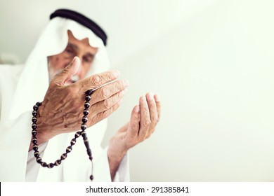 Elderly Muslim Arabic man praying