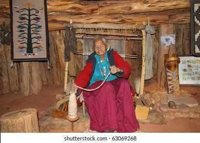 Elderly Navajo Woman Demonstrating Weaving