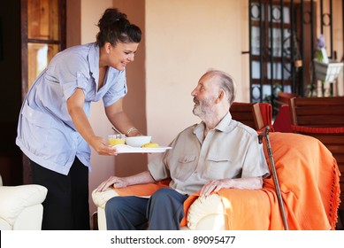 Elderly And Nurse Or Carer