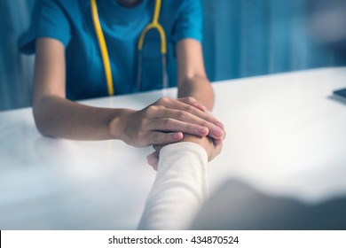 Elderly Patient With Doctor Woman Consulting For Encouraging In Treatment, Hipster View From Older Patient Woman In Clinic Or Hospital.