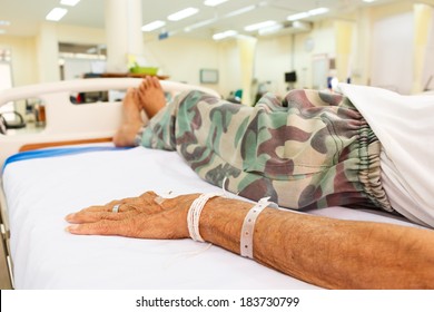 Elderly Patient Lie Down On Bed In Emergency Room In Rural Hospital ,Thailand