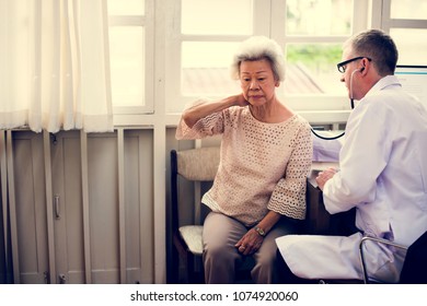 An Elderly Patient Meeting Doctor At The Hospital