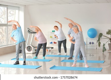 Elderly People Exercising In Gym