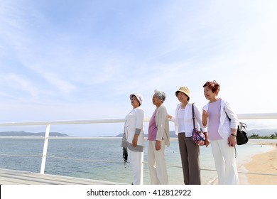 Elderly people are looking at the landscape