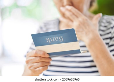 Elderly People Who Are Surprised To See The Bank Passbook