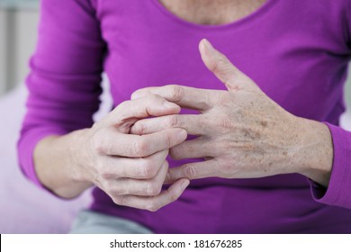 Elderly Person With Painful Hand - Powered by Shutterstock