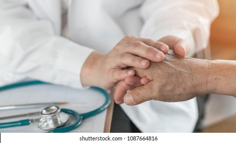 Elderly Senior Adult Patient Having Geriatric Doctor (geriatrician) Consulting And Diagnostic Examining On Aging And Mental Health Care In Medical Clinic Office Or Hospital Examination Room