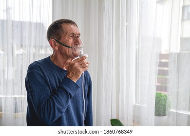 An Elderly Senior With An Oxygen Mask In Quarantine