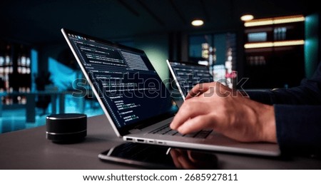 Elderly Senior Programmer Debugging Code On Multiple Laptops At Night.