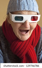 Elderly Woman With Anaglyph 3D Glasses Making Shocked Face.