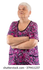 Elderly Woman With Arms Crossed Looking Up On White Background