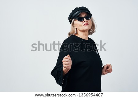 Similar – Image, Stock Photo Happy blonde woman with sunglasses and a hat enjoying the sun in nature