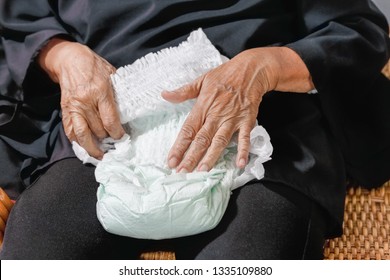 Elderly Woman Changing Diaper