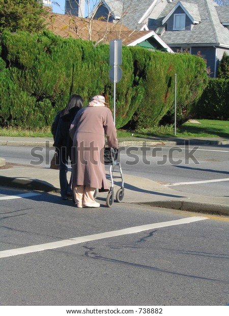 Elderly Woman Crossing Street Stock Photo (Edit Now) 738882