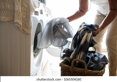 Elderly Woman Doing A Laundry