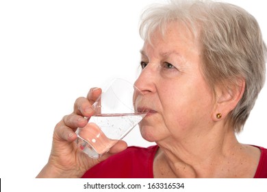 Elderly Woman Is Drinking Water