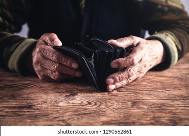 Elderly Woman With Empty Wallet. 