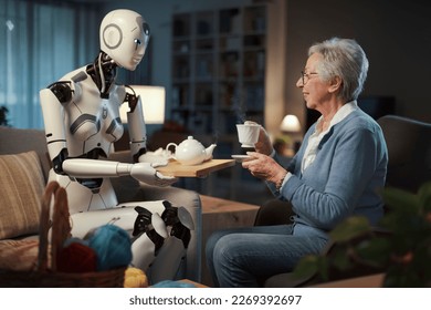 An elderly woman enjoys her afternoon tea, served by her robotic servant.