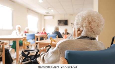 Elderly woman with foldable walker in nursing home - Powered by Shutterstock