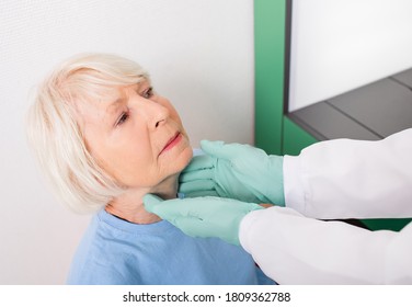 An Elderly Woman Have A Thyroid Check. Diagnosis Of Diseases Of The Endocrine System, Hyperthyroidism And Hypothyroidism