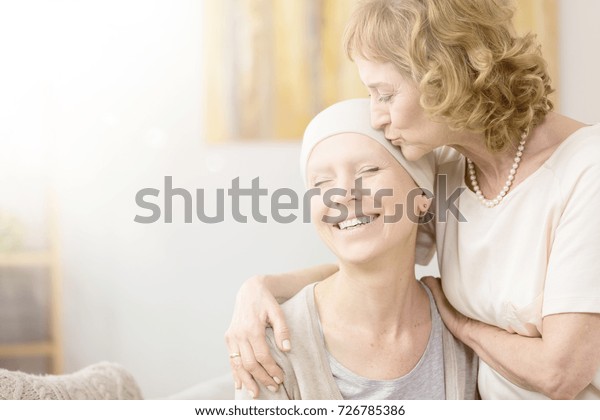 Elderly Woman Kissing Happy Cancer Survivors Stock Photo Edit Now