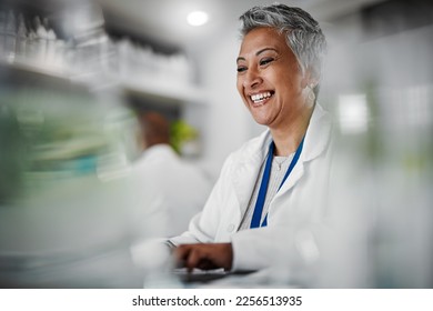 Elderly woman, lab and laptop for research, science and plants for analytics, pharmaceutical study and focus. Senior scientist, expert or computer for typing with data analysis for goal in laboratory