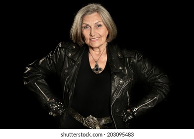 old woman in leather jacket