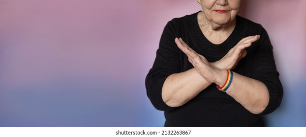 Elderly Woman Makes A Sign BreakTheBias With Her Arms Crossed. International Women's Day. Feminism, International Women's Day, 8, BreakTheBias. Gender Equal, Diverse, Equitable, And Inclusive World