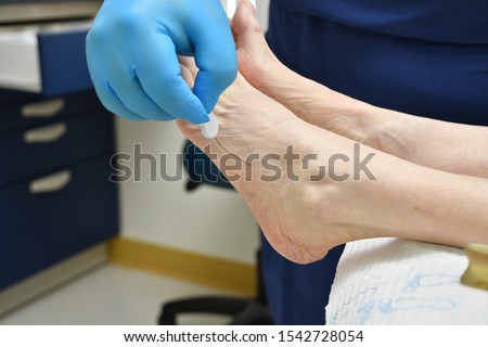 Elderly woman patient at podiatrist