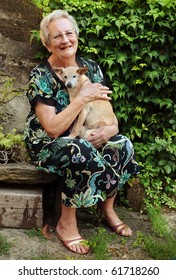 Elderly Woman With Pet Dog