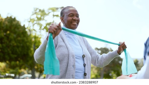 Elderly, woman and physiotherapy for fitness with resistance band in park, outside or garden for wellness. Black person, smile and happy with results in mobility, recovery or rehabilitation of injury - Powered by Shutterstock