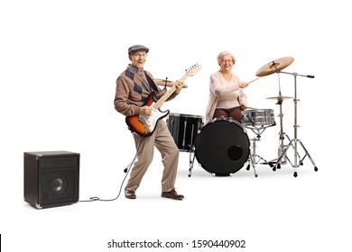 Elderly Woman Playing Drums And Man Playing An Electric Guitar Isolated On White Background