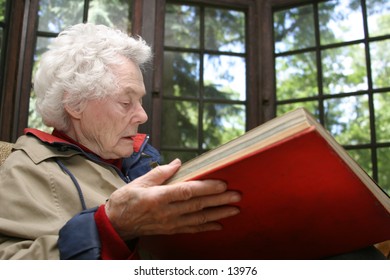 elderly woman reading